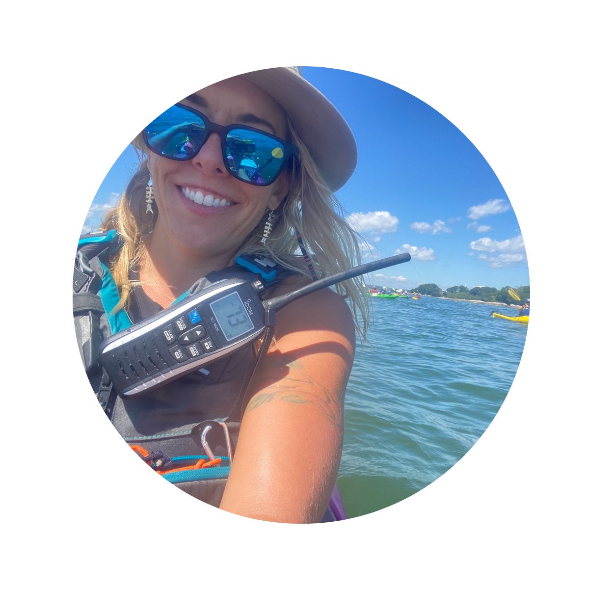 a woman taking a selfie in a body of water