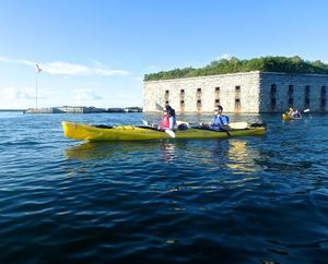 a small boat in a body of water