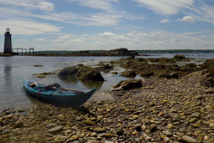 a small boat in a body of water