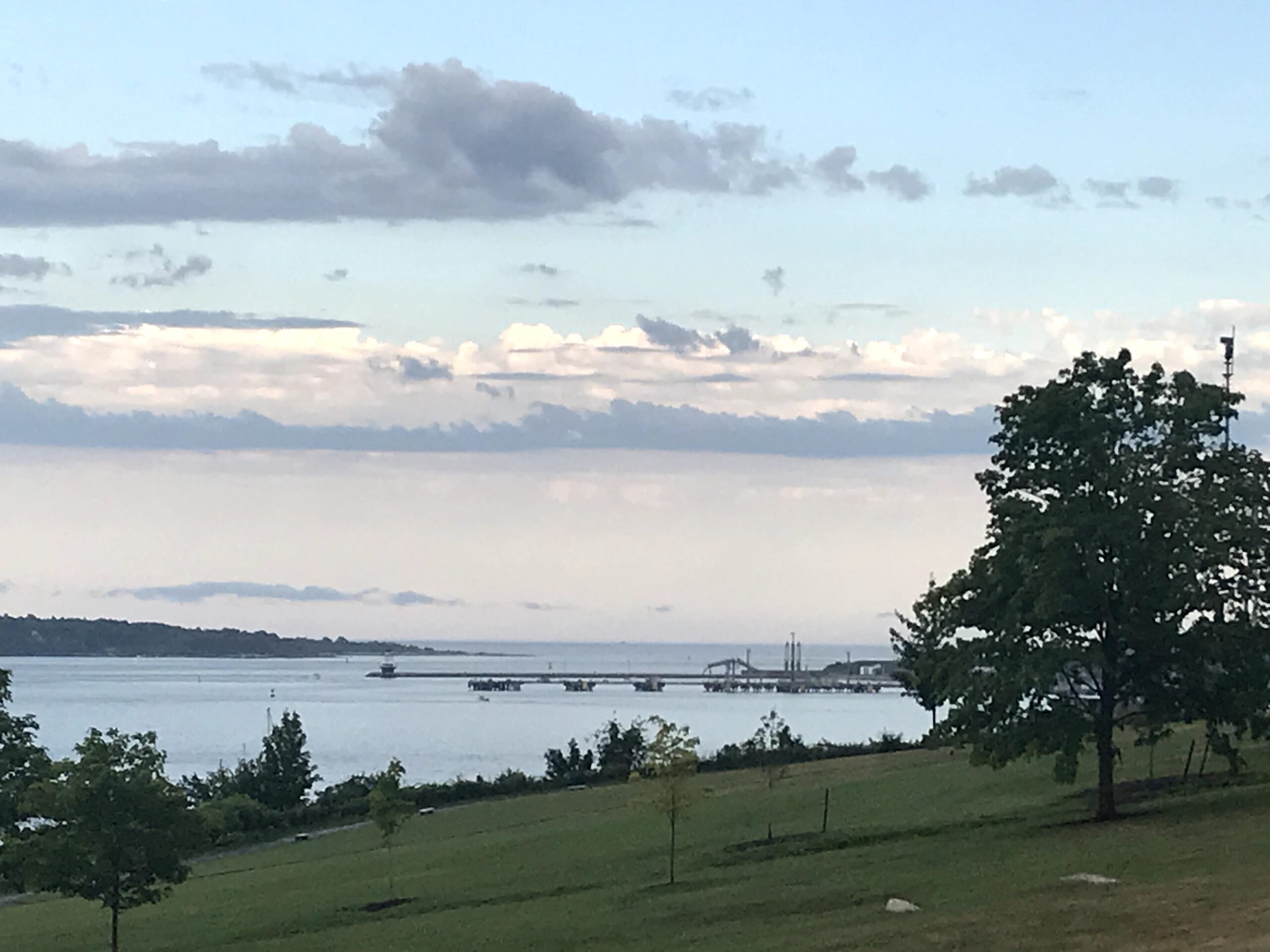 Views across the water from atop Munjoy Hill, several historic forts are visible as well as modern port infrastructure